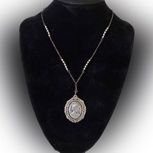 A truly special cameo necklace, sterling silver chain with genuine seed pearls.